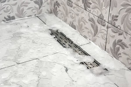 Dealing With A Backed Up Shower Drain Thumbnail